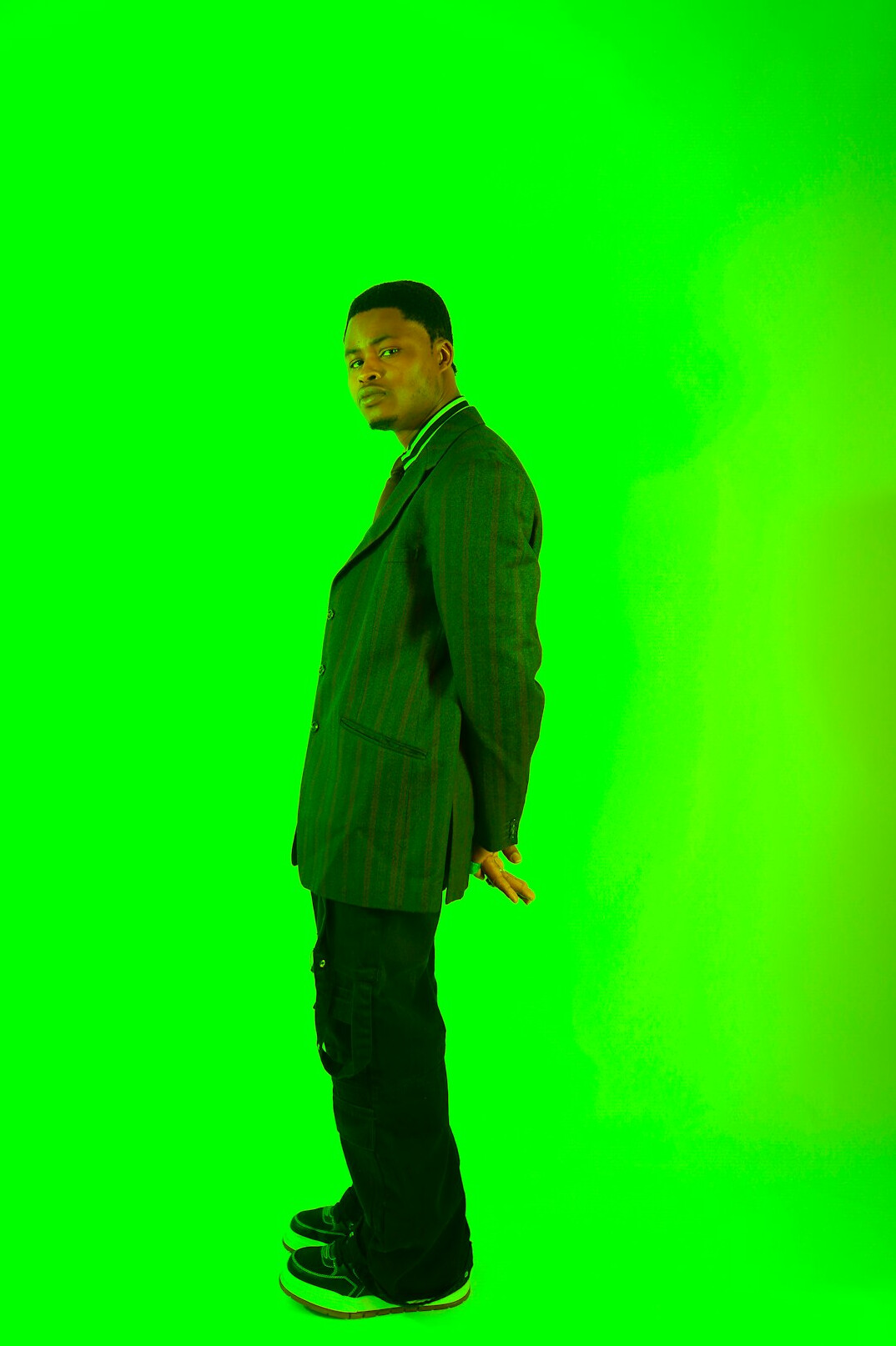 Green screen backdrop set up in a studio