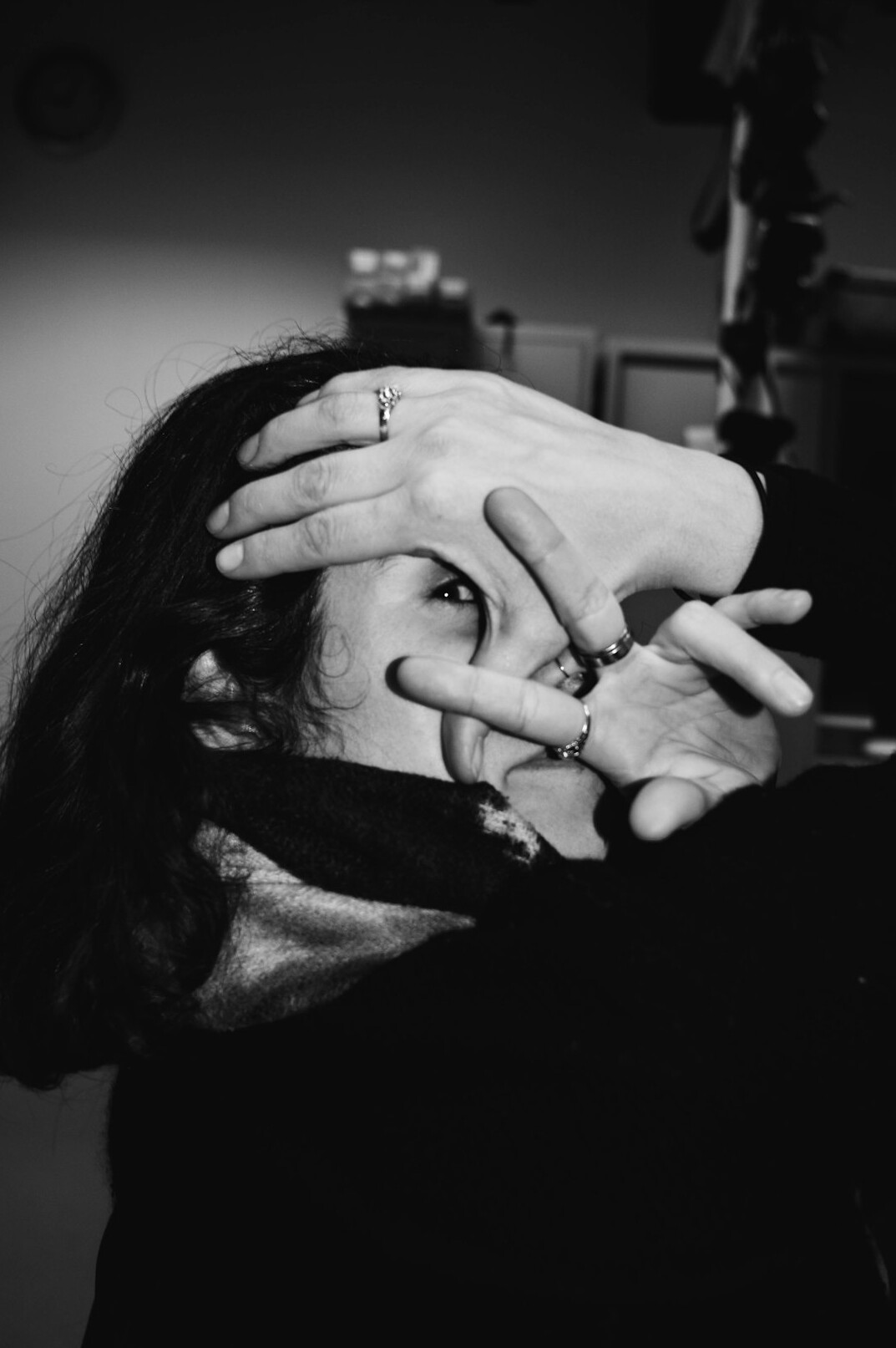 Camera operator adjusting a camera angle in a studio
