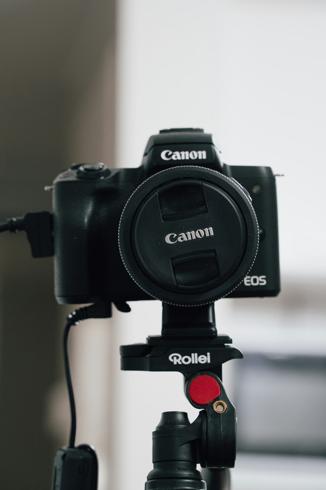 Professional video camera mounted on a tripod